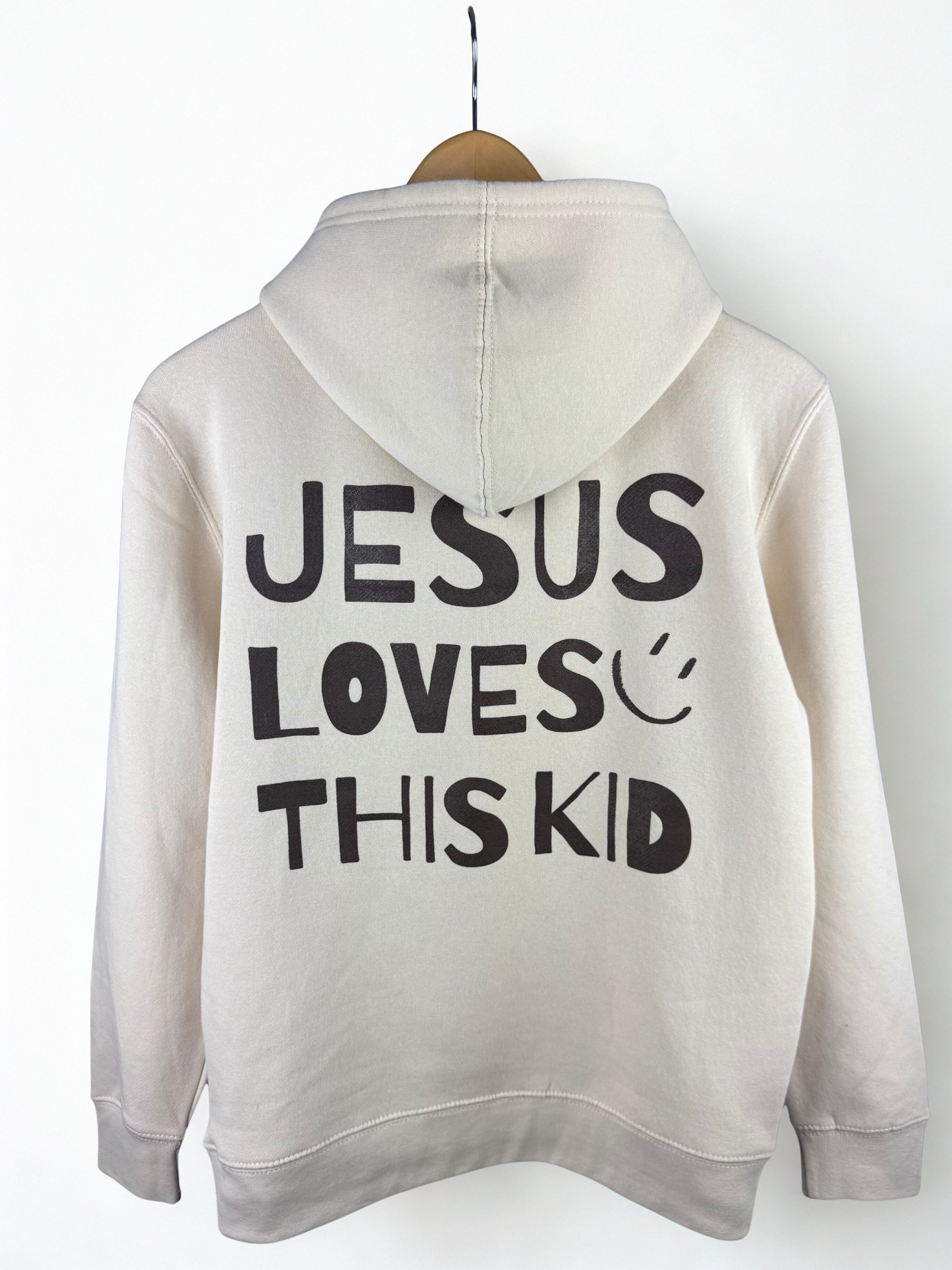 Cream hoodie with 'Jesus Loves This Kid' in Chocolate Brown text 